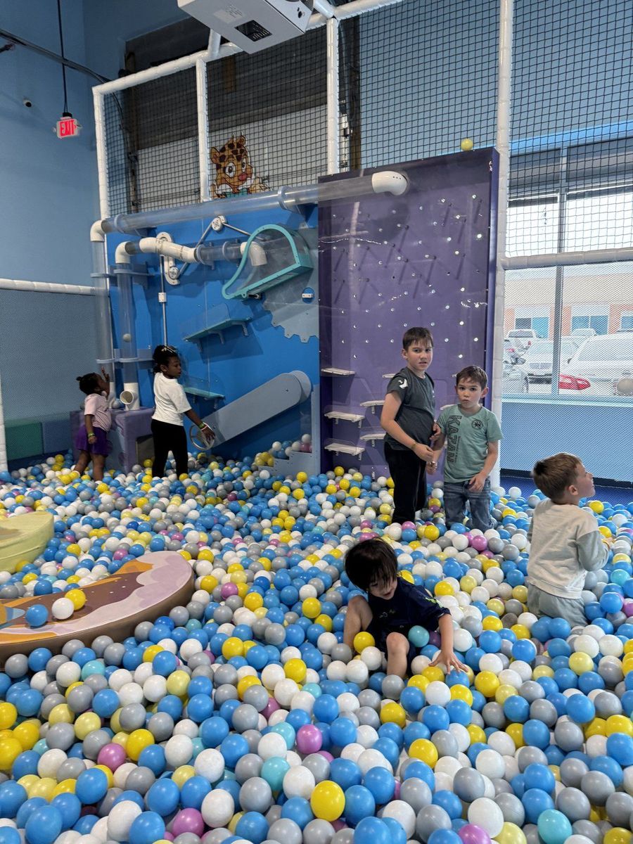Children playing in the ball pit and climbing structures at Hyper Kidz Crofton